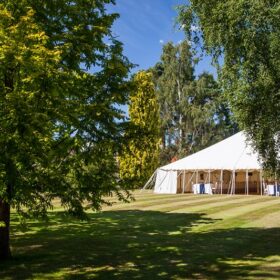 Open sided wedding marquee in summer | Lewis Marquees