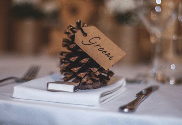 Groom Pine Cone Label table placement